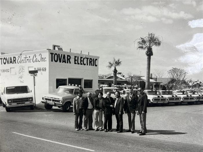 Tovar Electric team and trucks from the company's early years